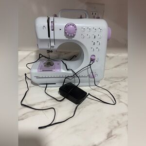 Portable White and Purple Sewing Machine